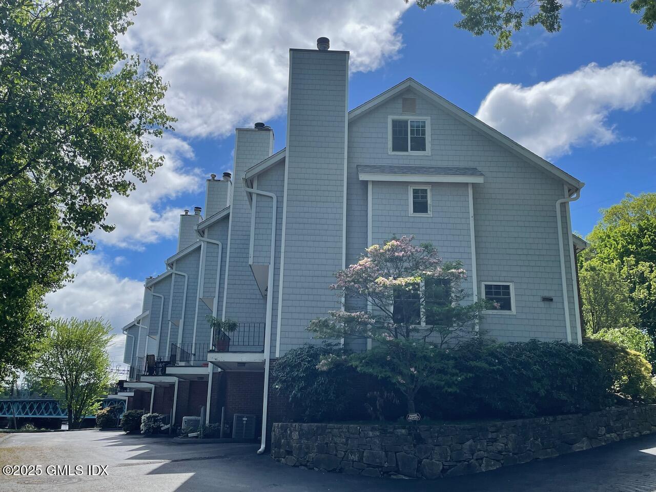 100 Strickland Road, Unit 6 Cos Cob, CT 06807 - Photo 27 of 28 Condo Garage Entrance