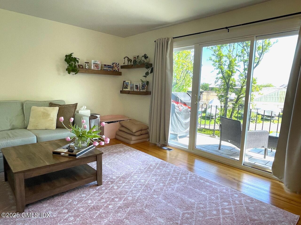 100 Strickland Road, Unit 6 Cos Cob, CT 06807 - Photo 8 of 28 Sliding Doors to Balcony