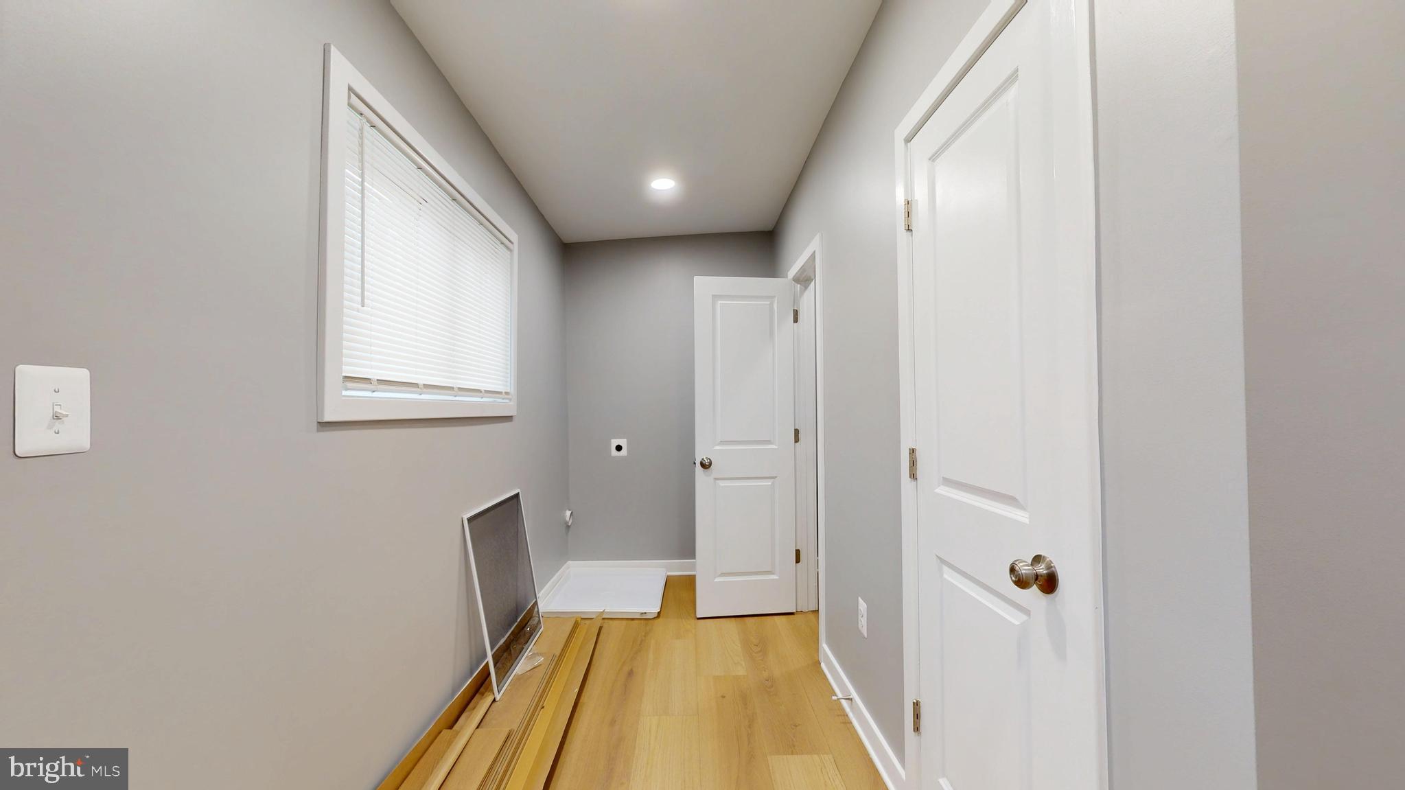 2519 East Fairmount Avenue Baltimore, MD 21224 - Photo 12 of 25 a view of a bathroom from the hallway