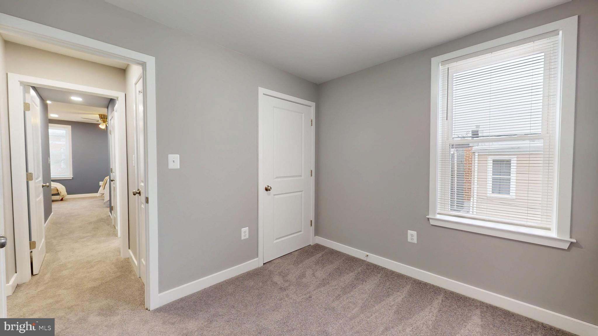 2519 East Fairmount Avenue Baltimore, MD 21224 - Photo 19 of 25 an empty room that has a window