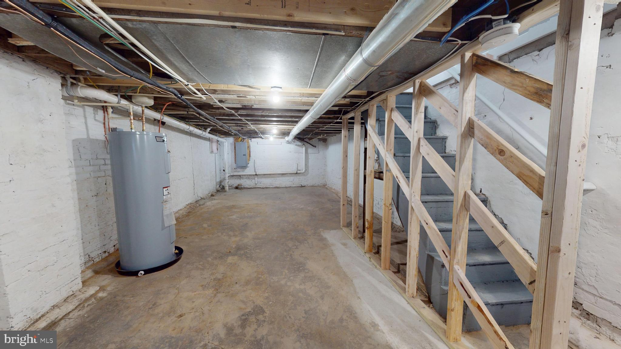 2519 East Fairmount Avenue Baltimore, MD 21224 - Photo 24 of 25 a view of an empty room with stairs