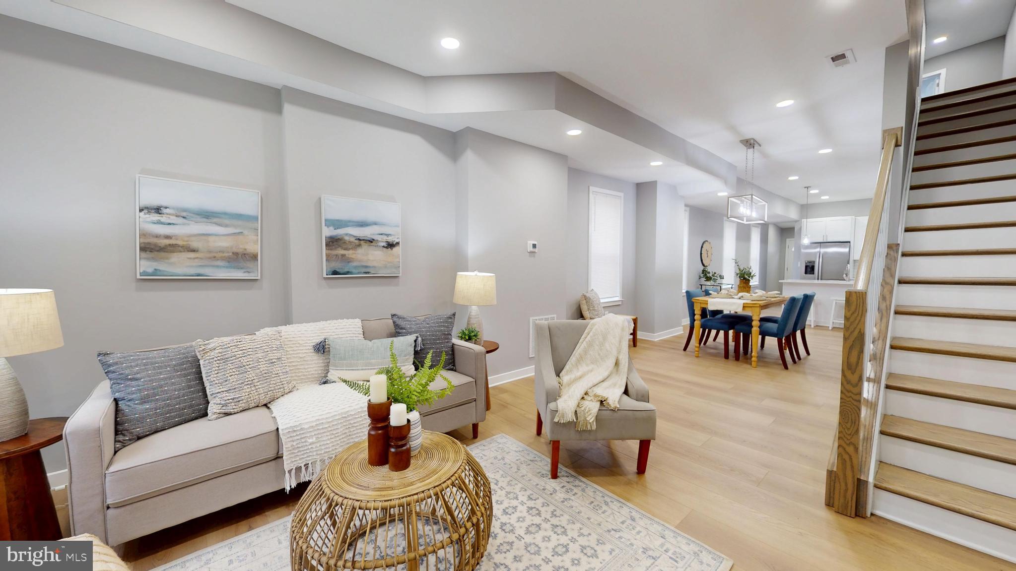 2519 East Fairmount Avenue Baltimore, MD 21224 - Photo 3 of 25 a living room with furniture and wooden floor