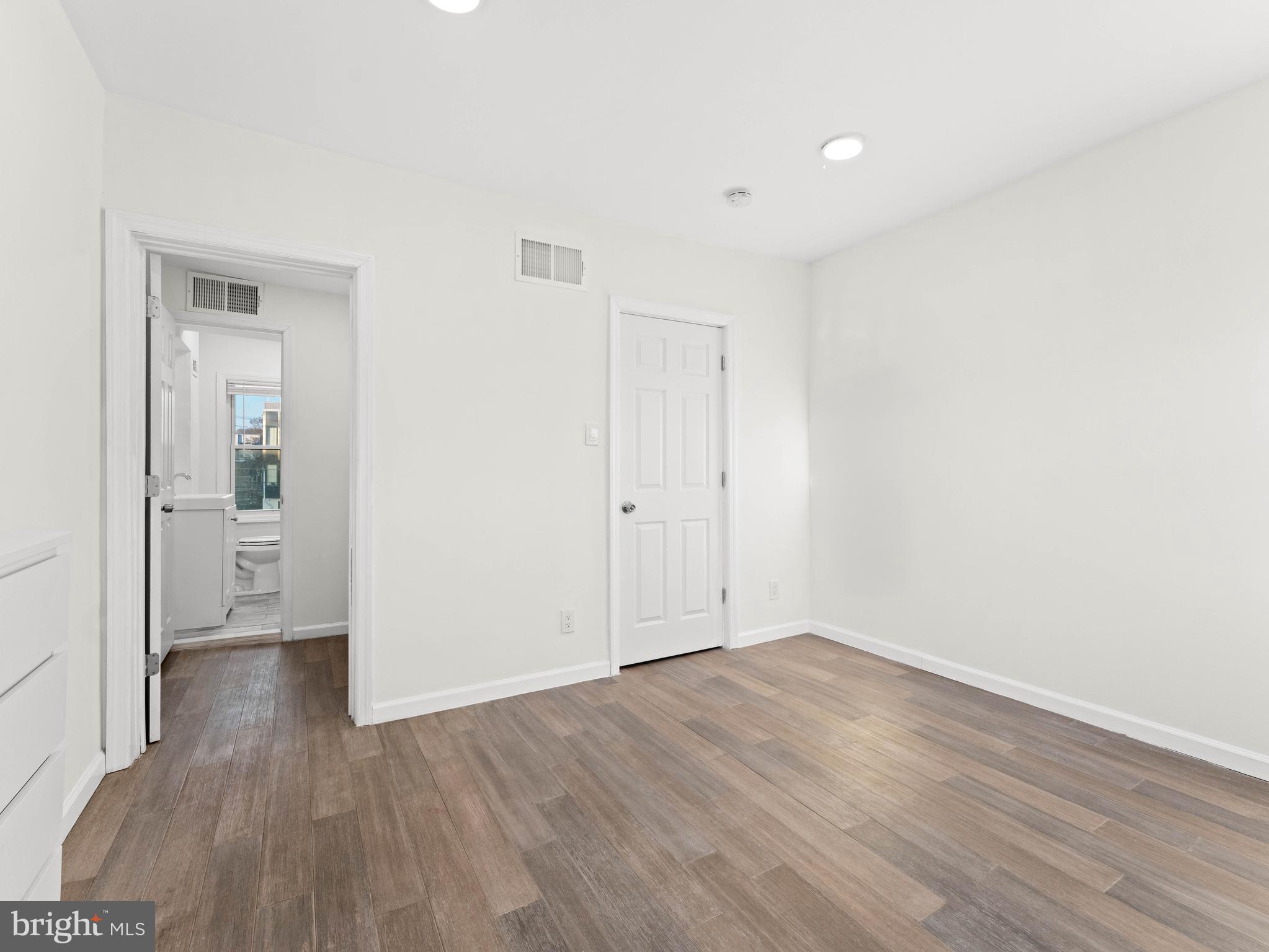 2443 Nicholas Street Philadelphia, PA 19121 - Photo 11 of 27 wooden floor in an empty room