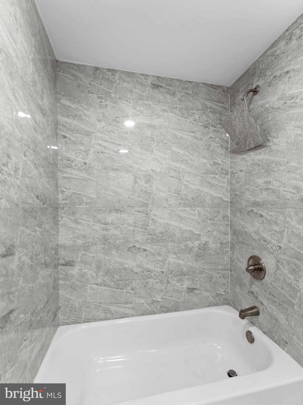 2443 Nicholas Street Philadelphia, PA 19121 - Photo 13 of 27 a bathroom with a bathtub