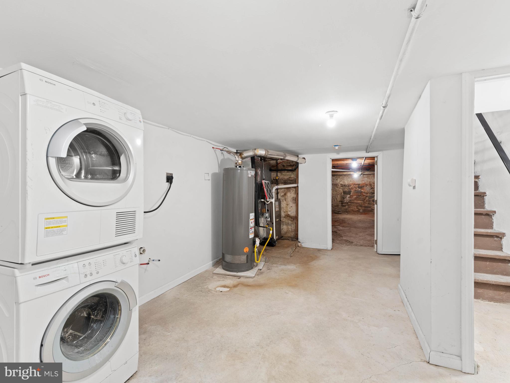 2443 Nicholas Street Philadelphia, PA 19121 - Photo 24 of 27 a view of a storage & utility room with washer and dryer