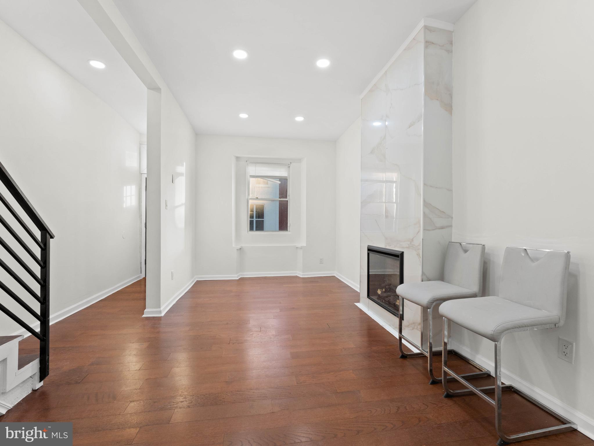2443 Nicholas Street Philadelphia, PA 19121 - Photo 3 of 27 a living room with furniture and a wooden floor