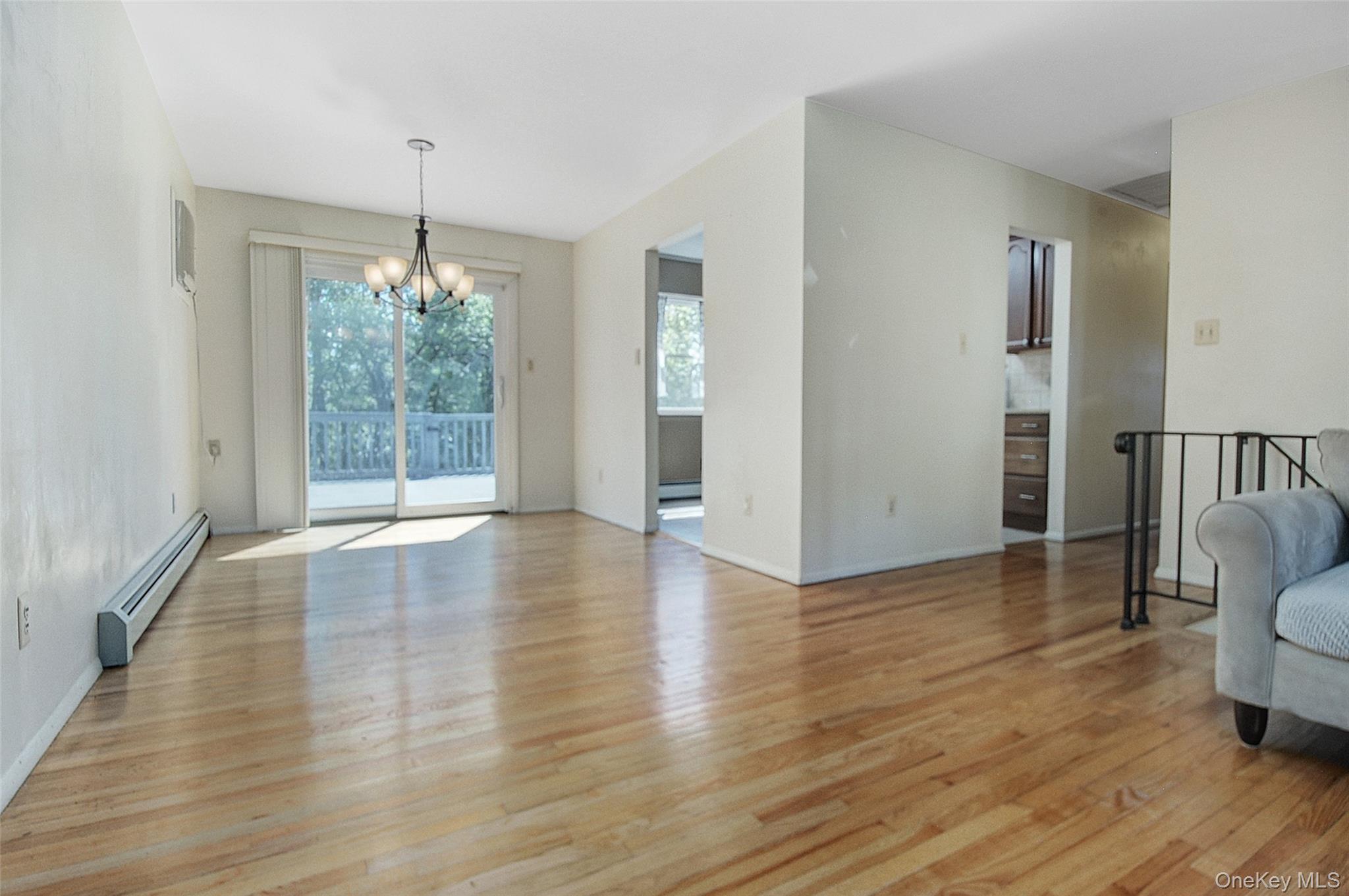 554 High Street Monroe, NY 10950 - Photo 11 of 29 a view of livingroom with furniture wooden floor and window