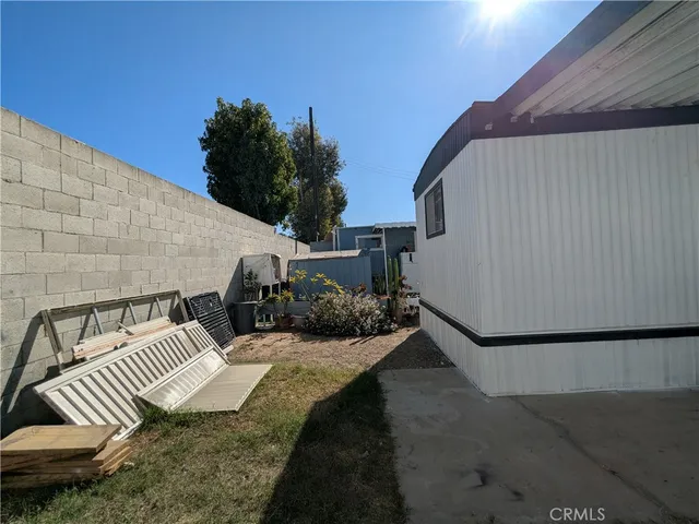 a view of balcony with furniture