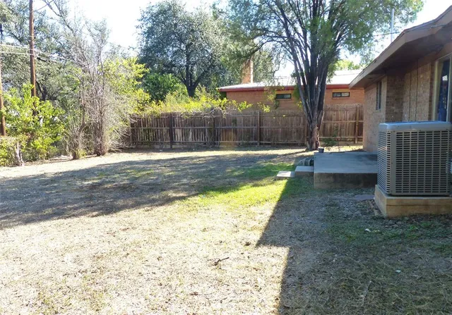 a view of yard with trees