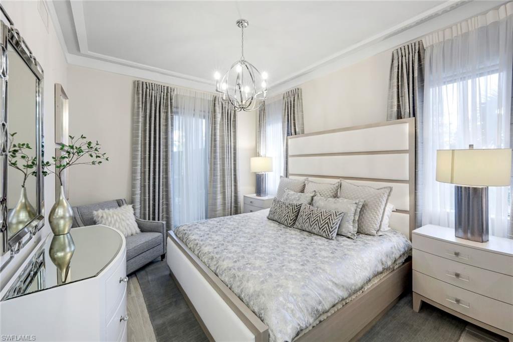 1135 3rd Avenue South, Unit 209 Naples, FL 34102 - Photo 17 of 31 Guest Bedroom 3 - walk out to wrap arounf covered Lanai