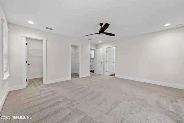 a view of a backyard with sitting area