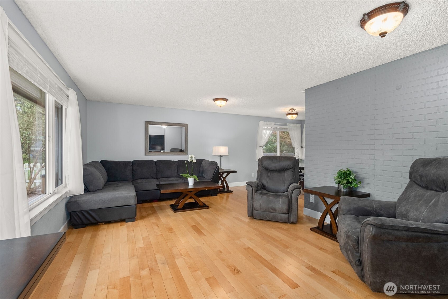 360 Byrd Street Centralia, WA 98531 - Photo 11 of 38 a living room with furniture and a window