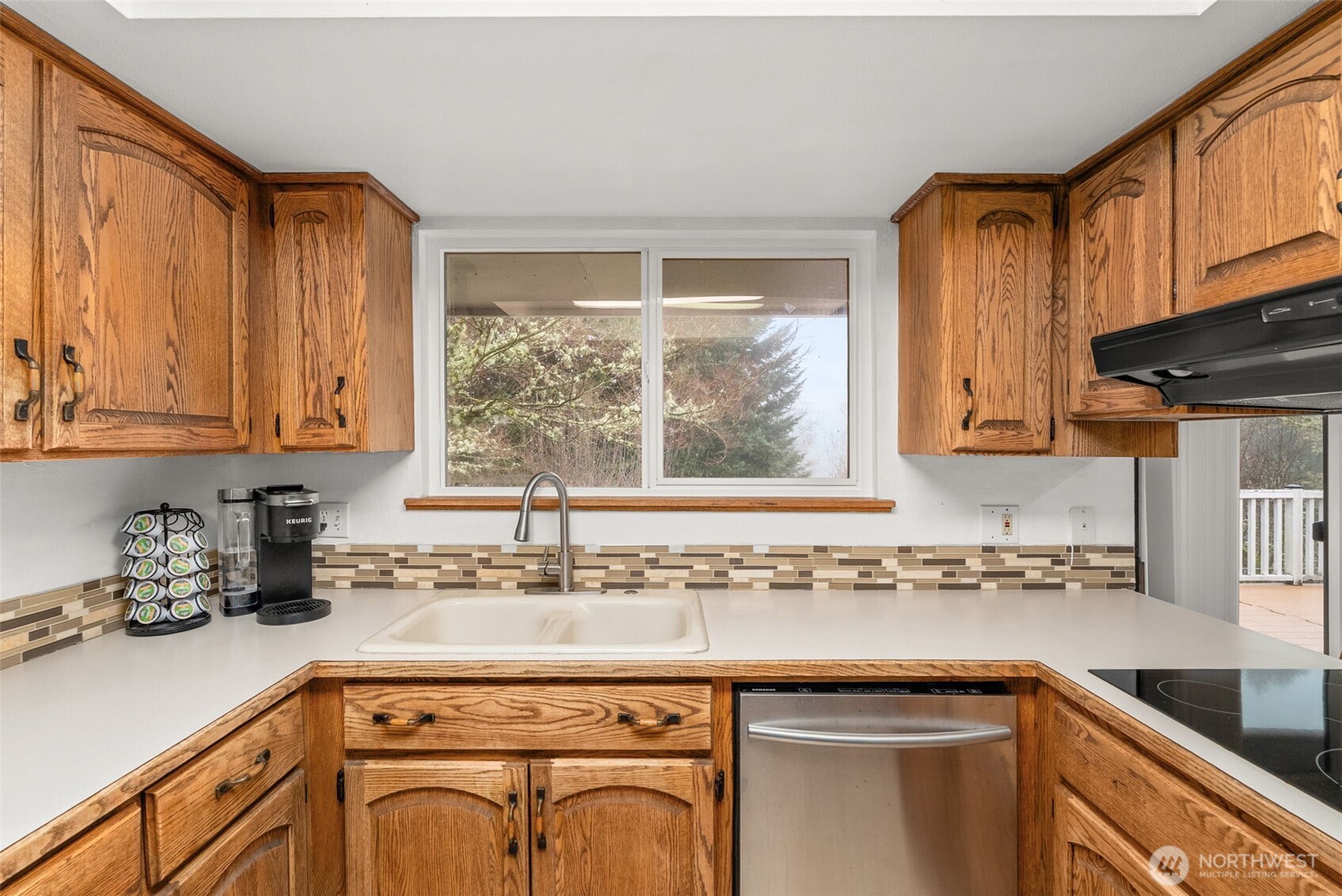 360 Byrd Street Centralia, WA 98531 - Photo 13 of 38 a kitchen with stainless steel appliances granite countertop a sink a stove and cabinets
