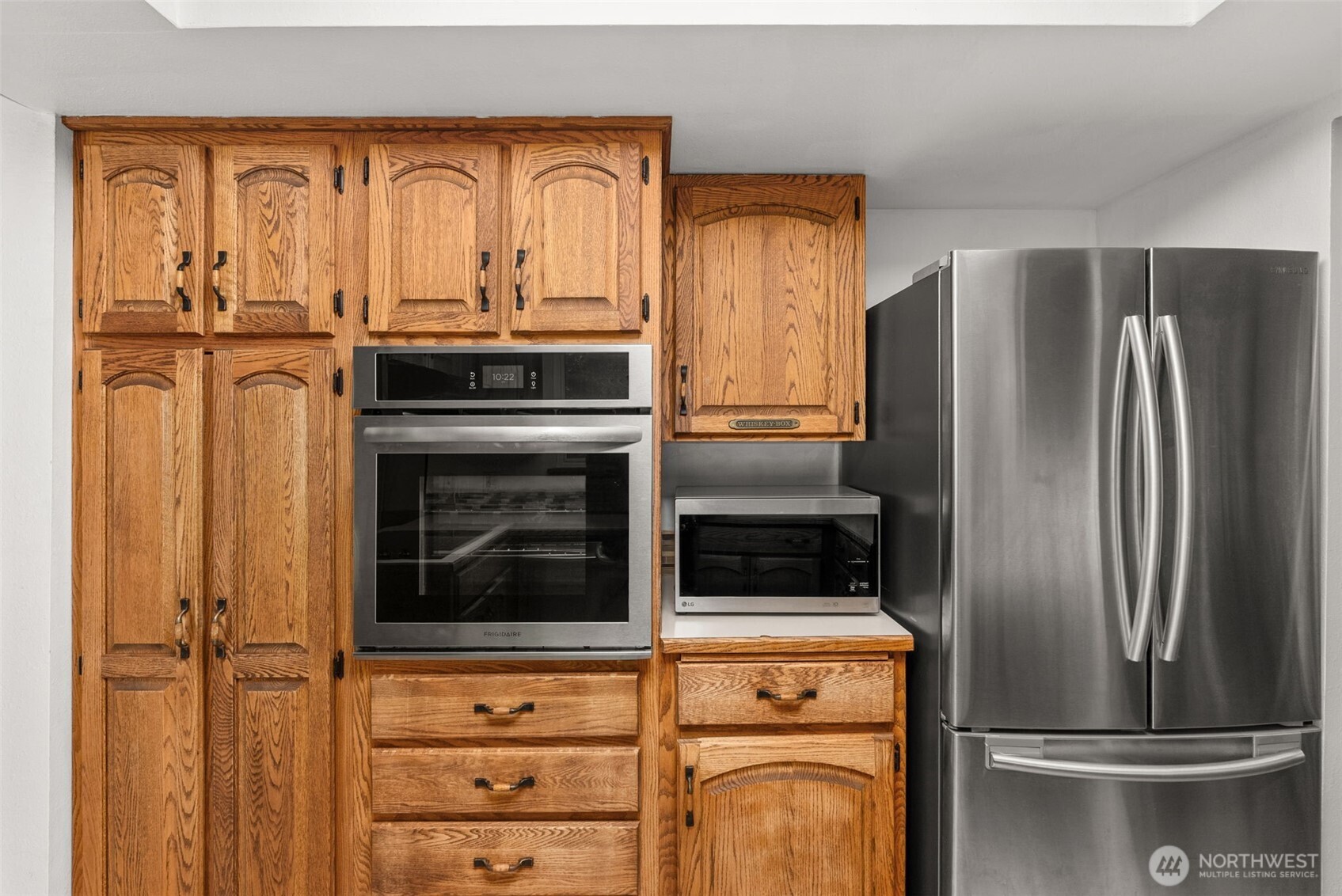 360 Byrd Street Centralia, WA 98531 - Photo 14 of 38 a kitchen with stainless steel appliances granite countertop a refrigerator and a stove top oven