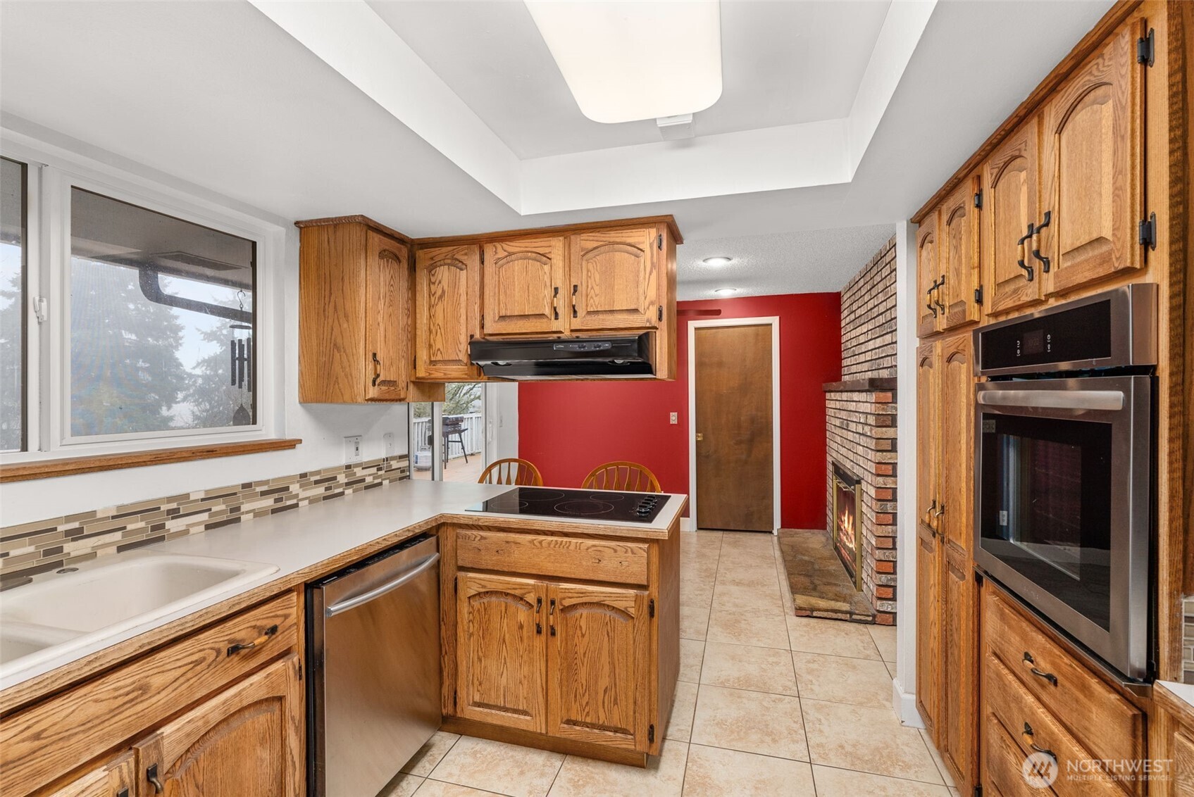 360 Byrd Street Centralia, WA 98531 - Photo 15 of 38 a kitchen with stainless steel appliances granite countertop a stove sink and cabinets