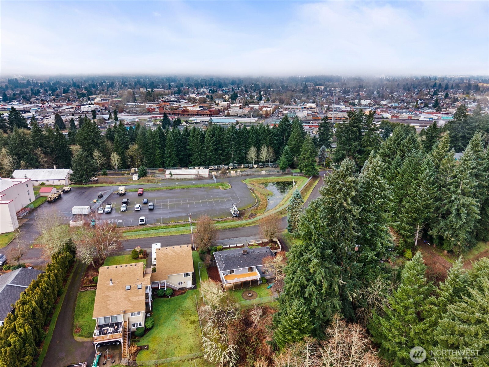 360 Byrd Street Centralia, WA 98531 - Photo 4 of 38 an aerial view of a house with a swimming pool