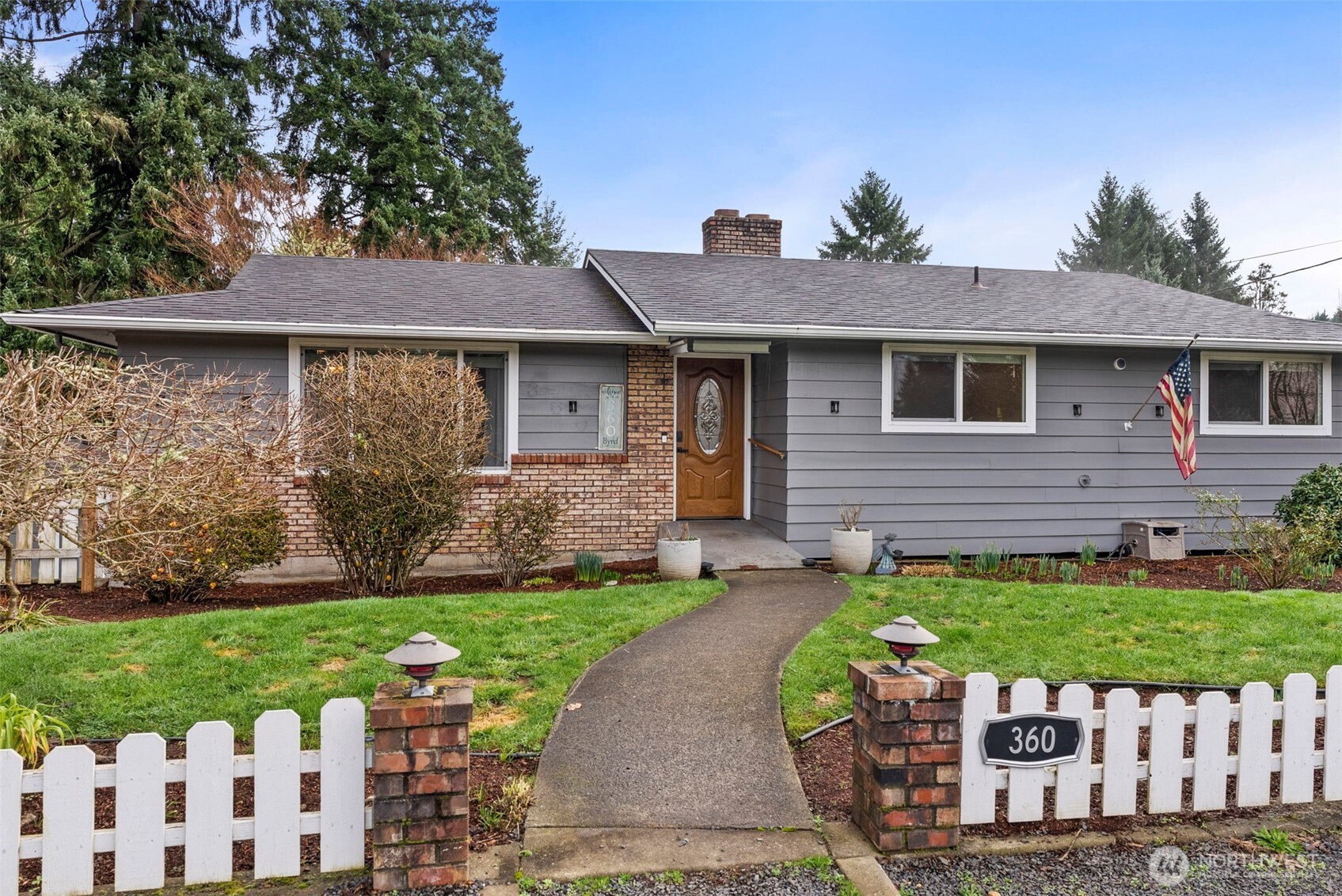 360 Byrd Street Centralia, WA 98531 - Photo 7 of 38 a front view of a house with a yard