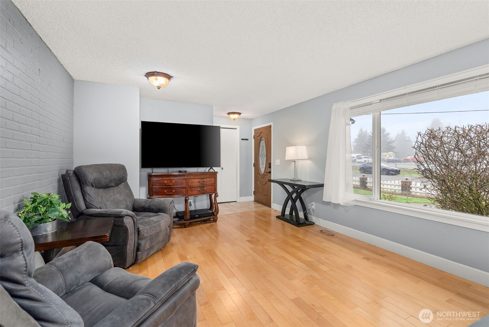 360 Byrd Street Centralia, WA 98531 - Photo 10 of 38 a living room with furniture and a flat screen tv