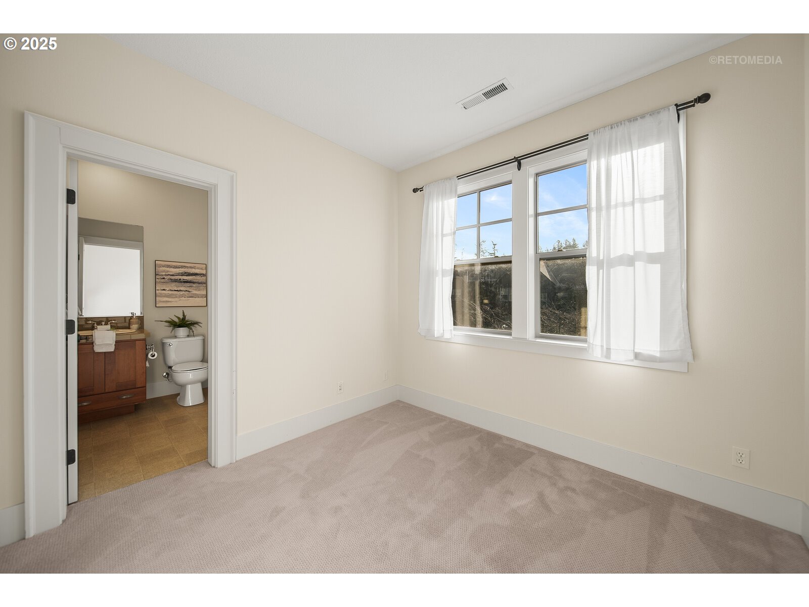 10225 Southwest Taylor Street Portland, OR 97225 - Photo 21 of 43 a room with a window and a bathroom