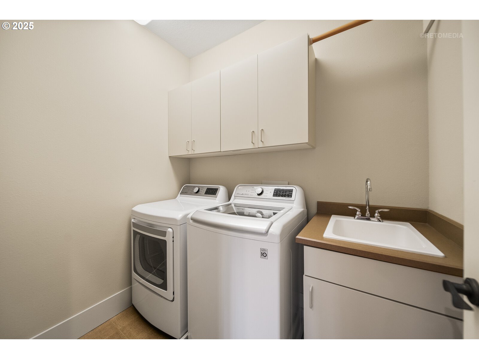 10225 Southwest Taylor Street Portland, OR 97225 - Photo 24 of 43 a utility room with dryer and washer