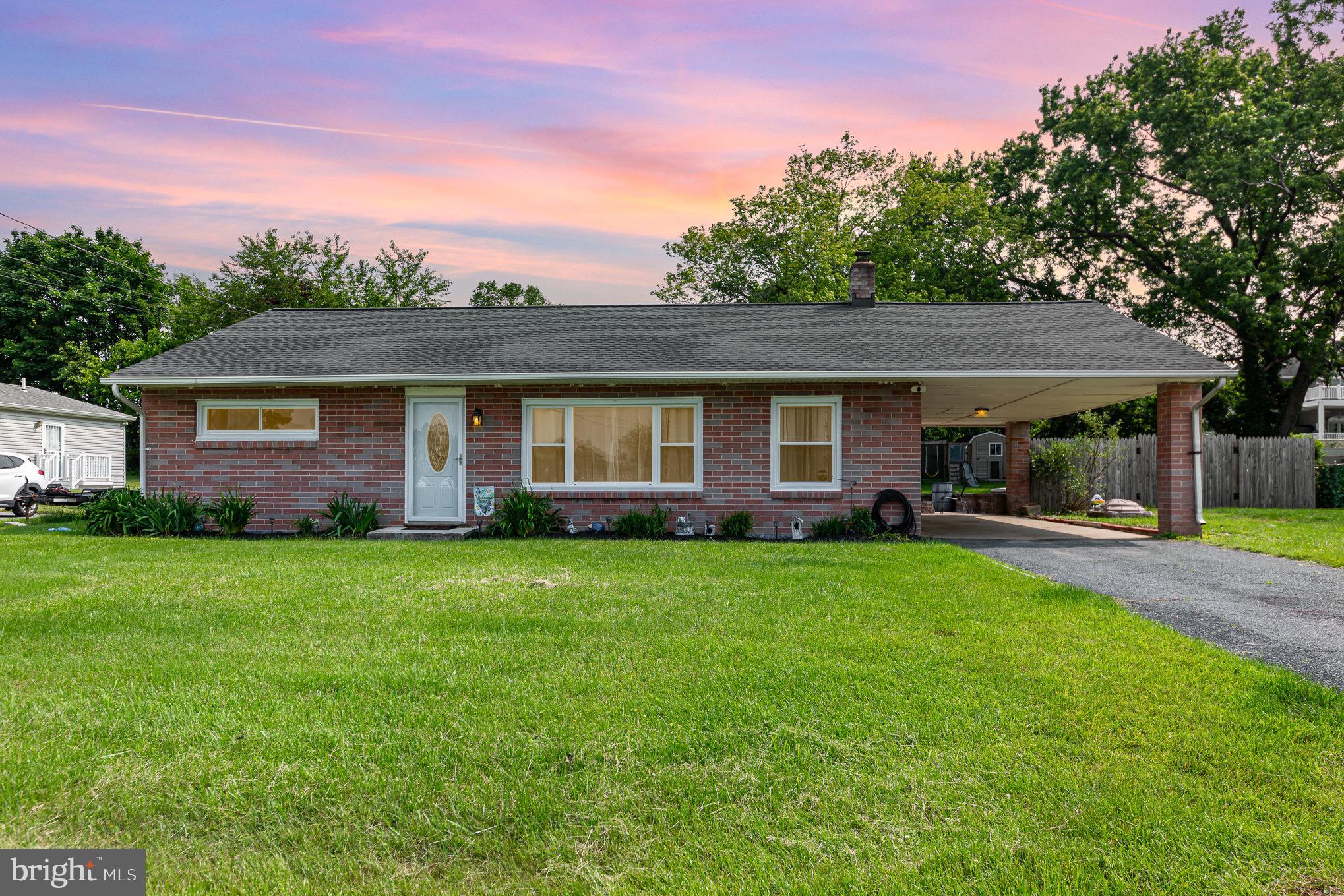 4116 Kahlston Road Baltimore, MD 21236 - Photo 1 of 37 a front view of a house with yard patio and green space