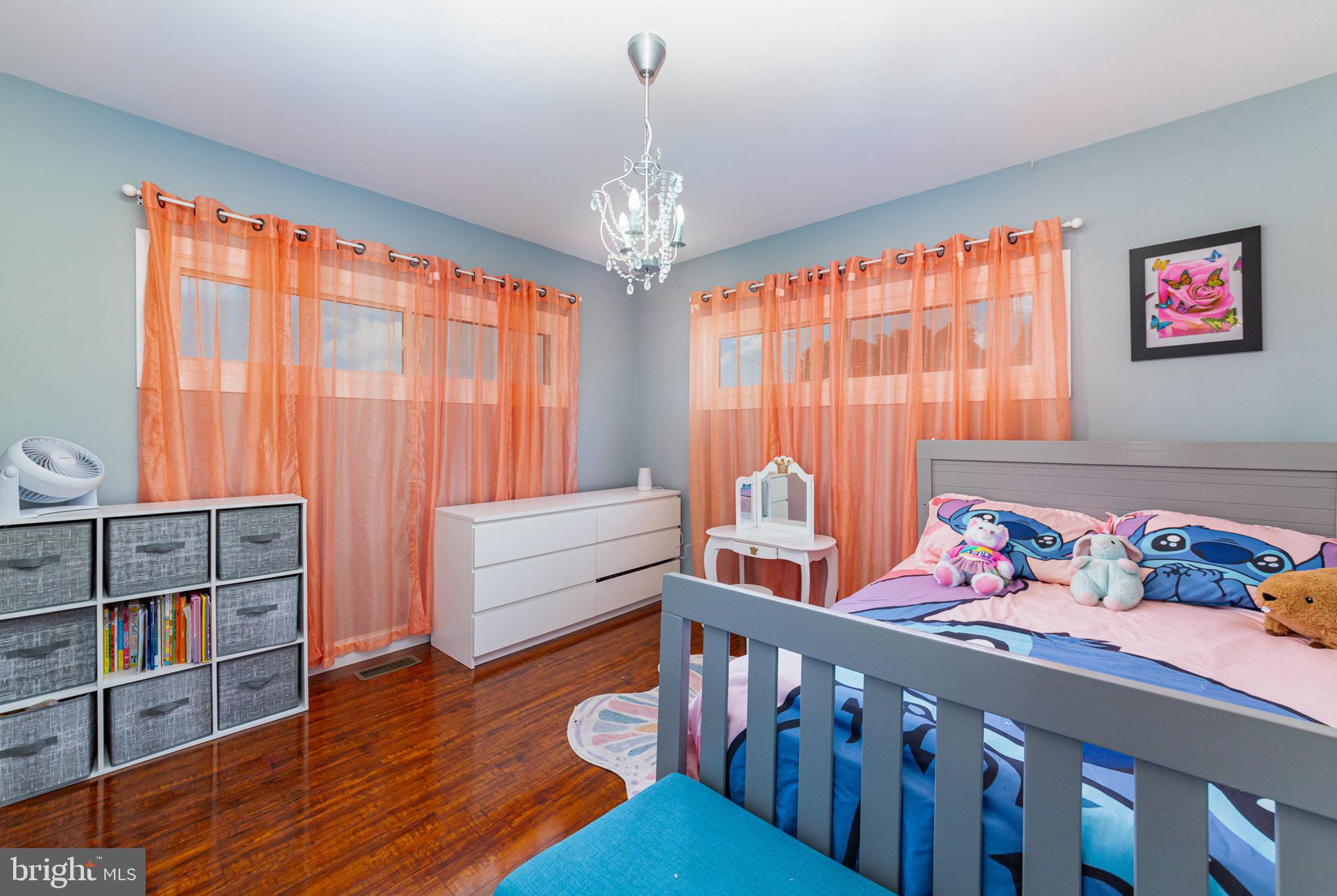 4116 Kahlston Road Baltimore, MD 21236 - Photo 13 of 37 a bedroom with furniture and a window