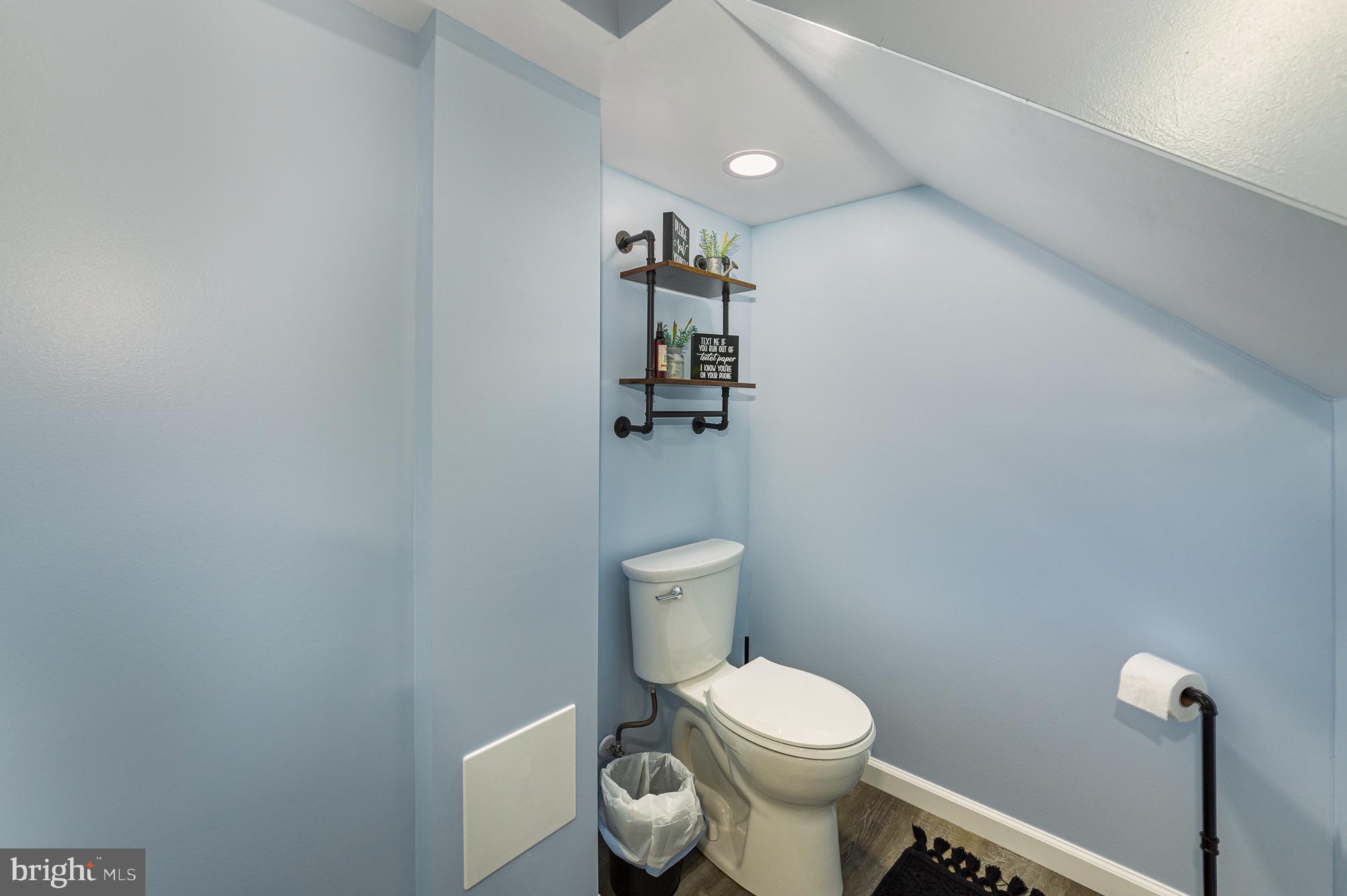 4116 Kahlston Road Baltimore, MD 21236 - Photo 28 of 37 a white toilet sitting next to a small bathroom