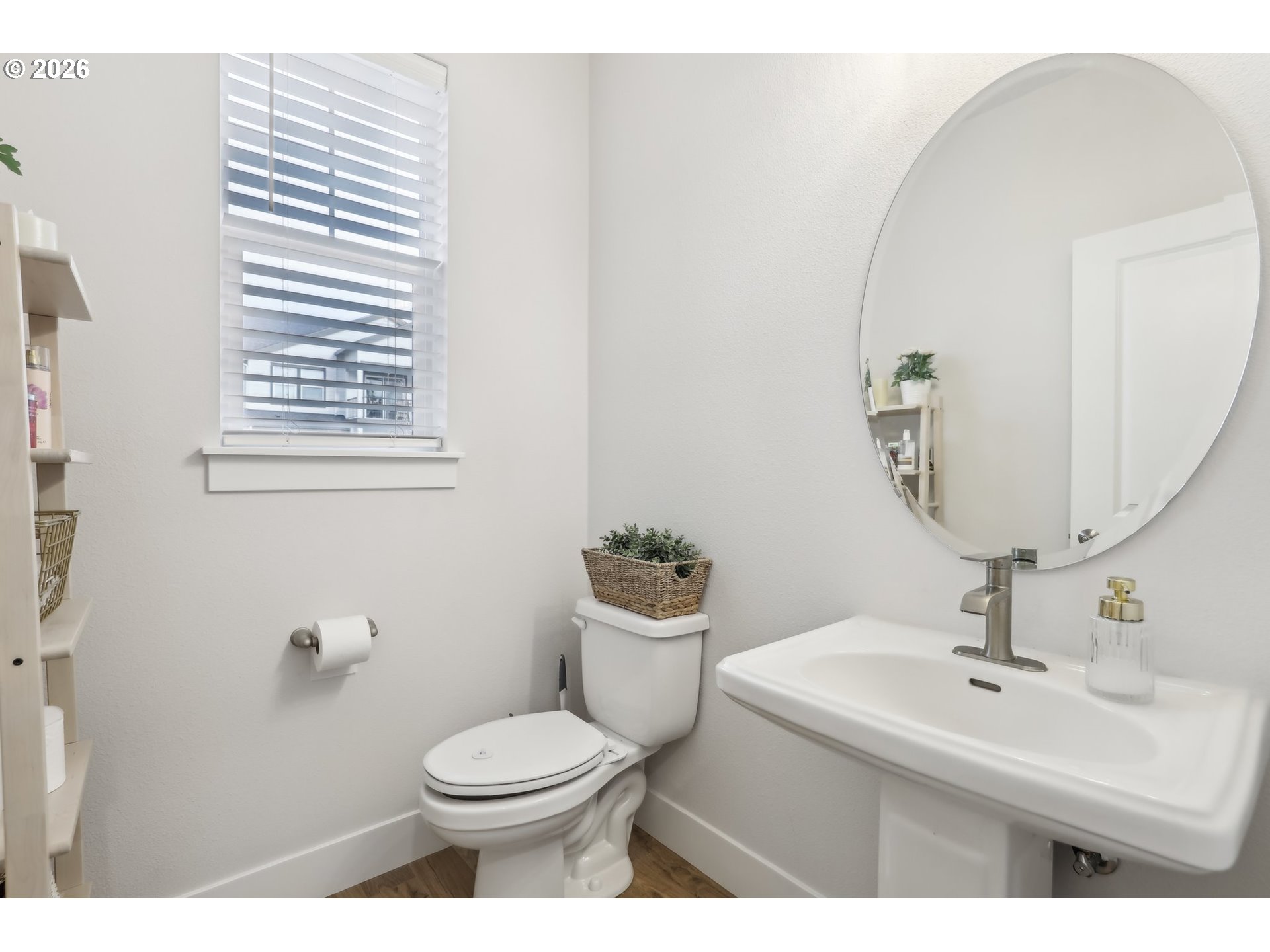 18436 Southwest Buckhorn Drive Beaverton, OR 97007 - Photo 16 of 35 a bathroom with a sink a toilet and mirror