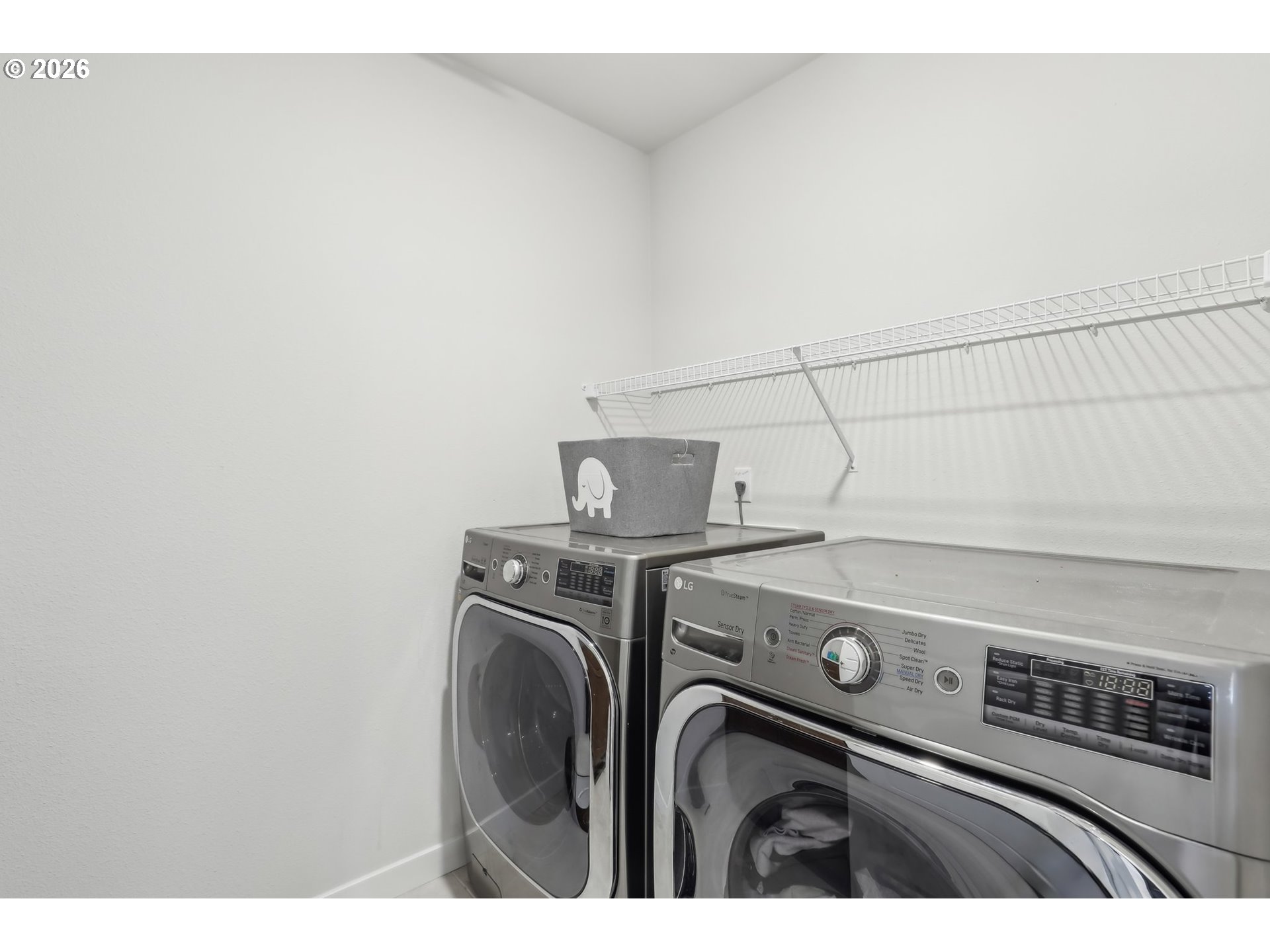 18436 Southwest Buckhorn Drive Beaverton, OR 97007 - Photo 22 of 35 a utility room with dryer and washer