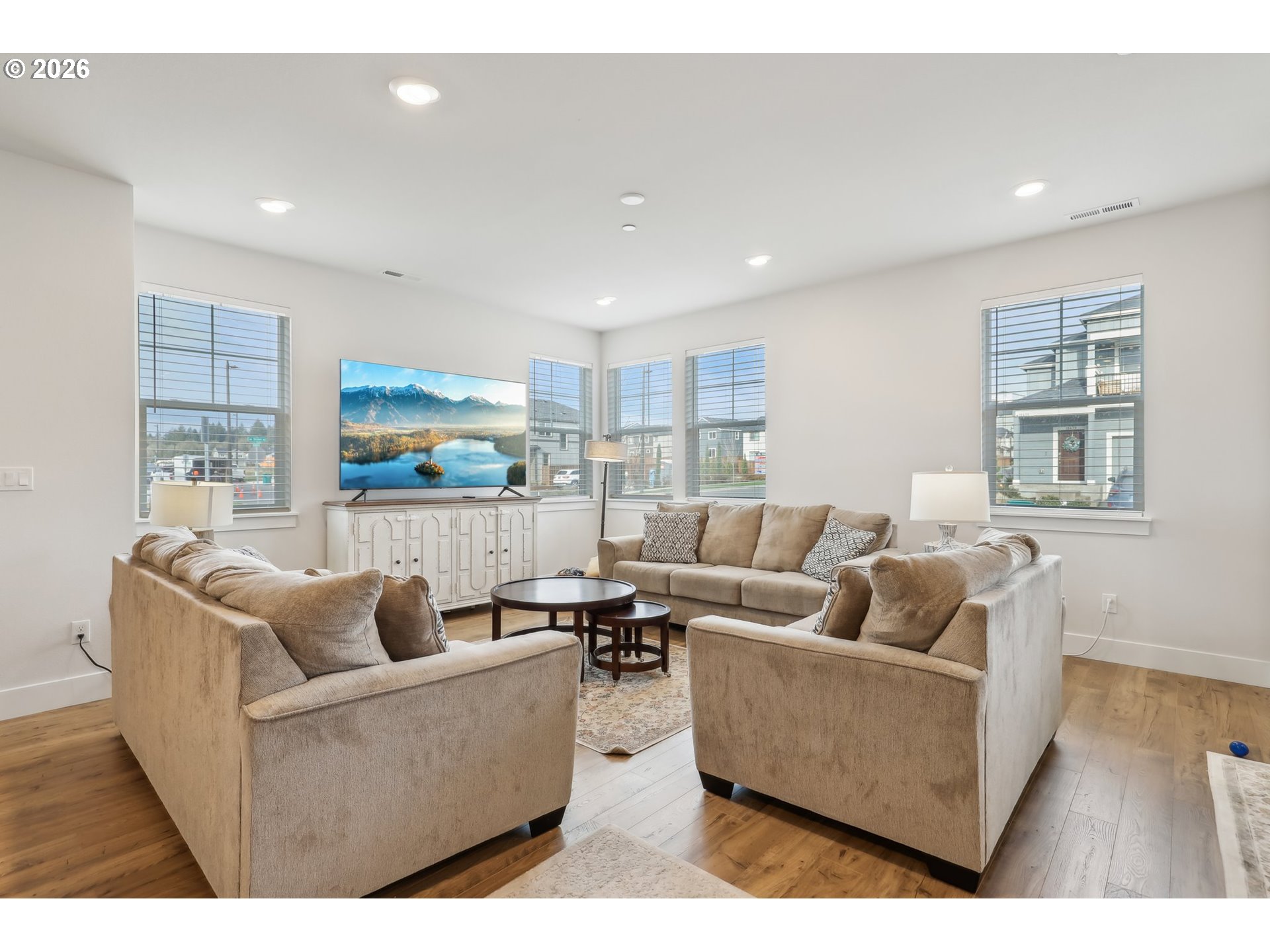 18436 Southwest Buckhorn Drive Beaverton, OR 97007 - Photo 5 of 35 a living room with furniture and a large window