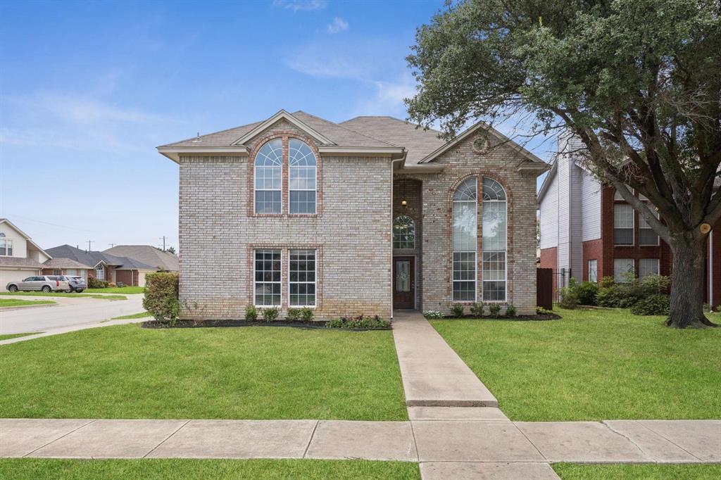 2138 Stoneridge Drive Keller, TX 76248 - Photo 1 of 1 a front view of a house with a yard