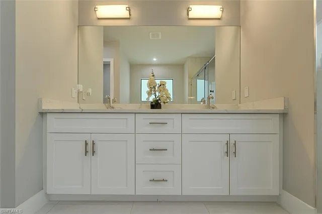 a white bath tub sitting in a bathroom