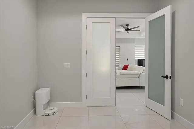 a view of a room with a garden and trees