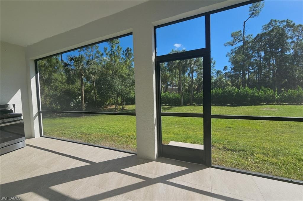 2330 4th Avenue Southeast Naples, FL 34117 - Photo 38 of 43 a view of a room with a garden and trees