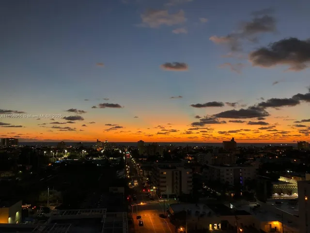 a view of an ocean and city