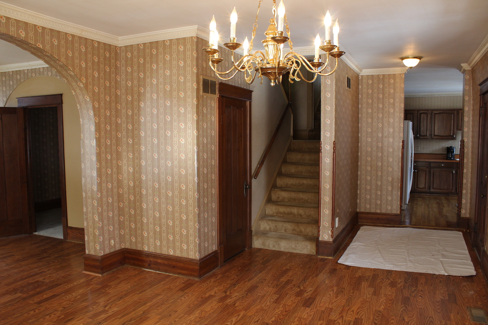 1245 Main Street Antioch, IL 60002 - Photo 13 of 44 a view of a hallway with wooden floor and stairs