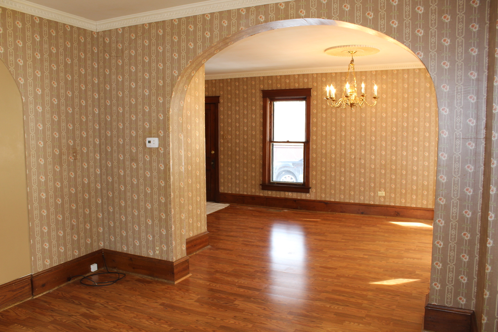 1245 Main Street Antioch, IL 60002 - Photo 16 of 44 a view of empty room with wooden floor and fan