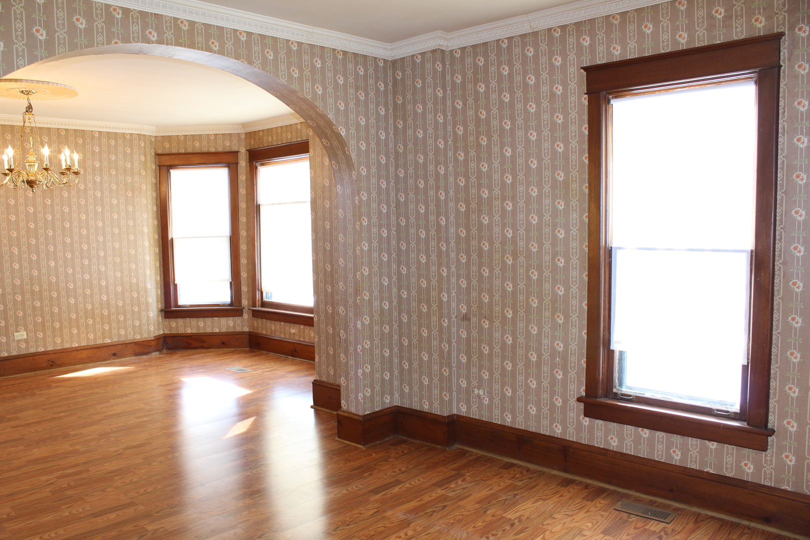 1245 Main Street Antioch, IL 60002 - Photo 17 of 44 an empty room with wooden floor and windows