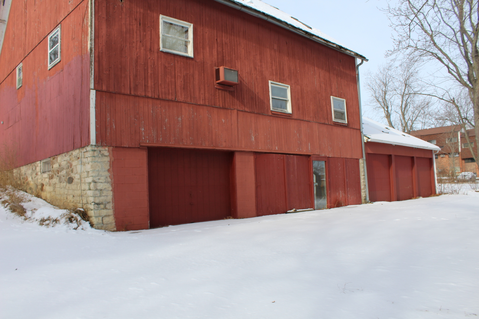 1245 Main Street Antioch, IL 60002 - Photo 4 of 44 a front view of a house with a yard and garage