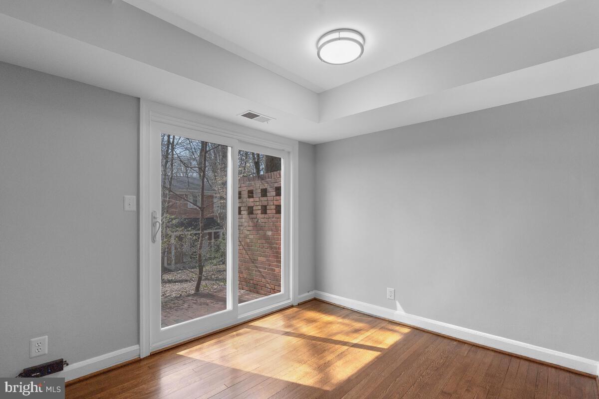 8603 Geren Road, Unit 257 Silver Spring, MD 20901 - Photo 12 of 36 Sliders from Dining Room to Private Brick Patio