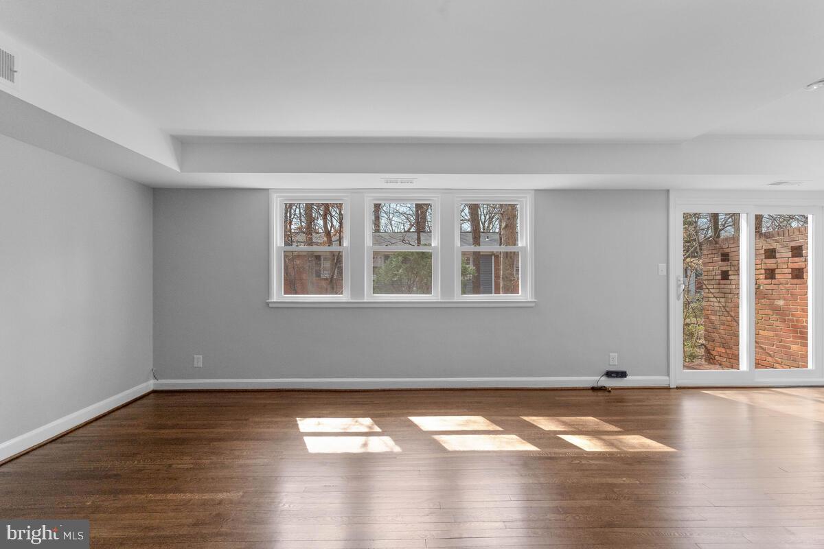 8603 Geren Road, Unit 257 Silver Spring, MD 20901 - Photo 7 of 36 Living Room Flooded with Natural Light