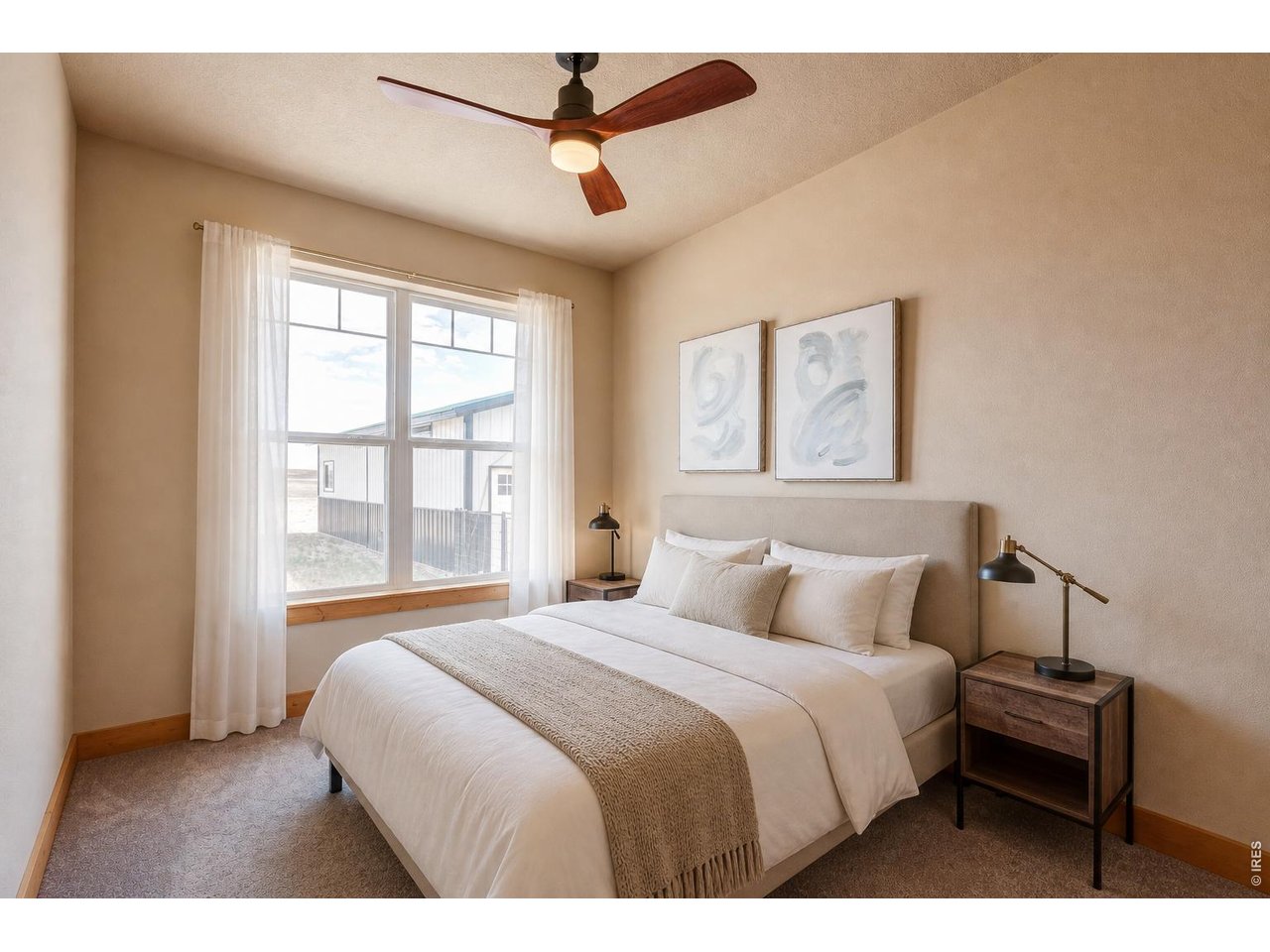18298 Romar Ranch Road Carr, CO 80612 - Photo 26 of 49 a bedroom with a large bed and a window
