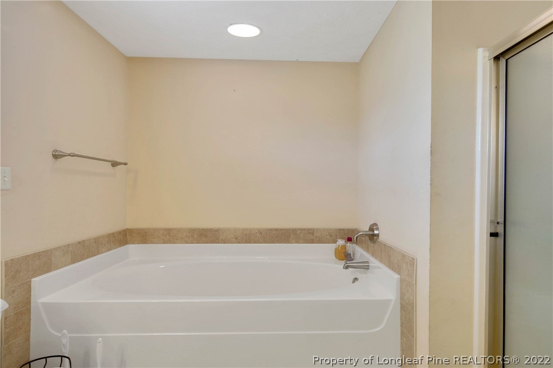 7640 Rufus Johnson Road Fayetteville, NC 28306 - Photo 27 of 39 a bathroom with a bathtub