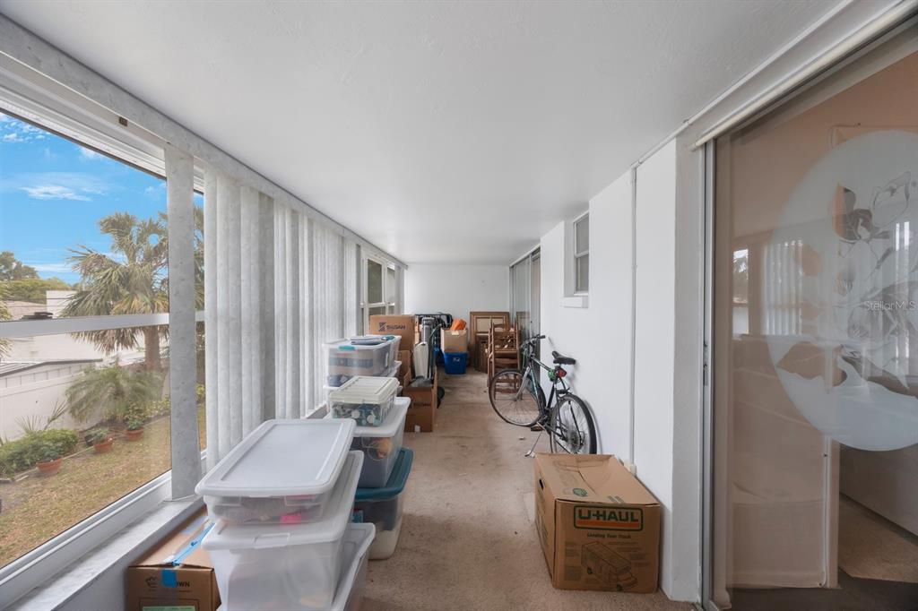 9945 47th Avenue North, Unit 203 St. Petersburg, FL 33708 - Photo 23 of 29 a view of a room with gym equipment