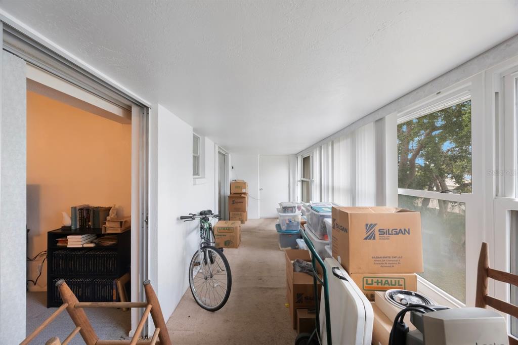 9945 47th Avenue North, Unit 203 St. Petersburg, FL 33708 - Photo 24 of 29 a view of a livingroom with furniture window