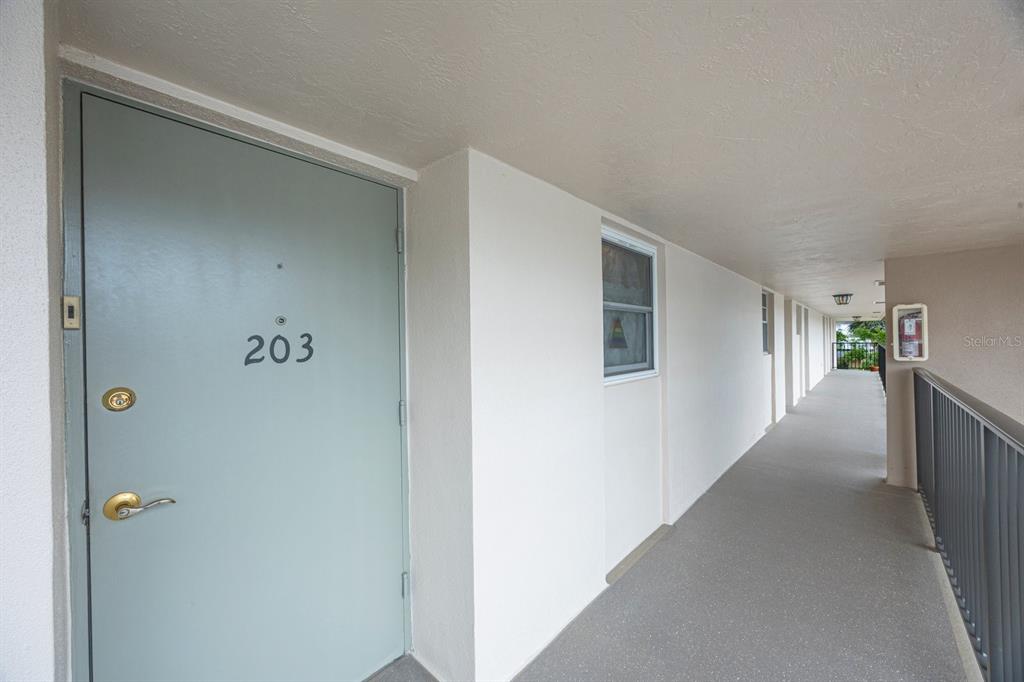 9945 47th Avenue North, Unit 203 St. Petersburg, FL 33708 - Photo 3 of 29 a view of hallway