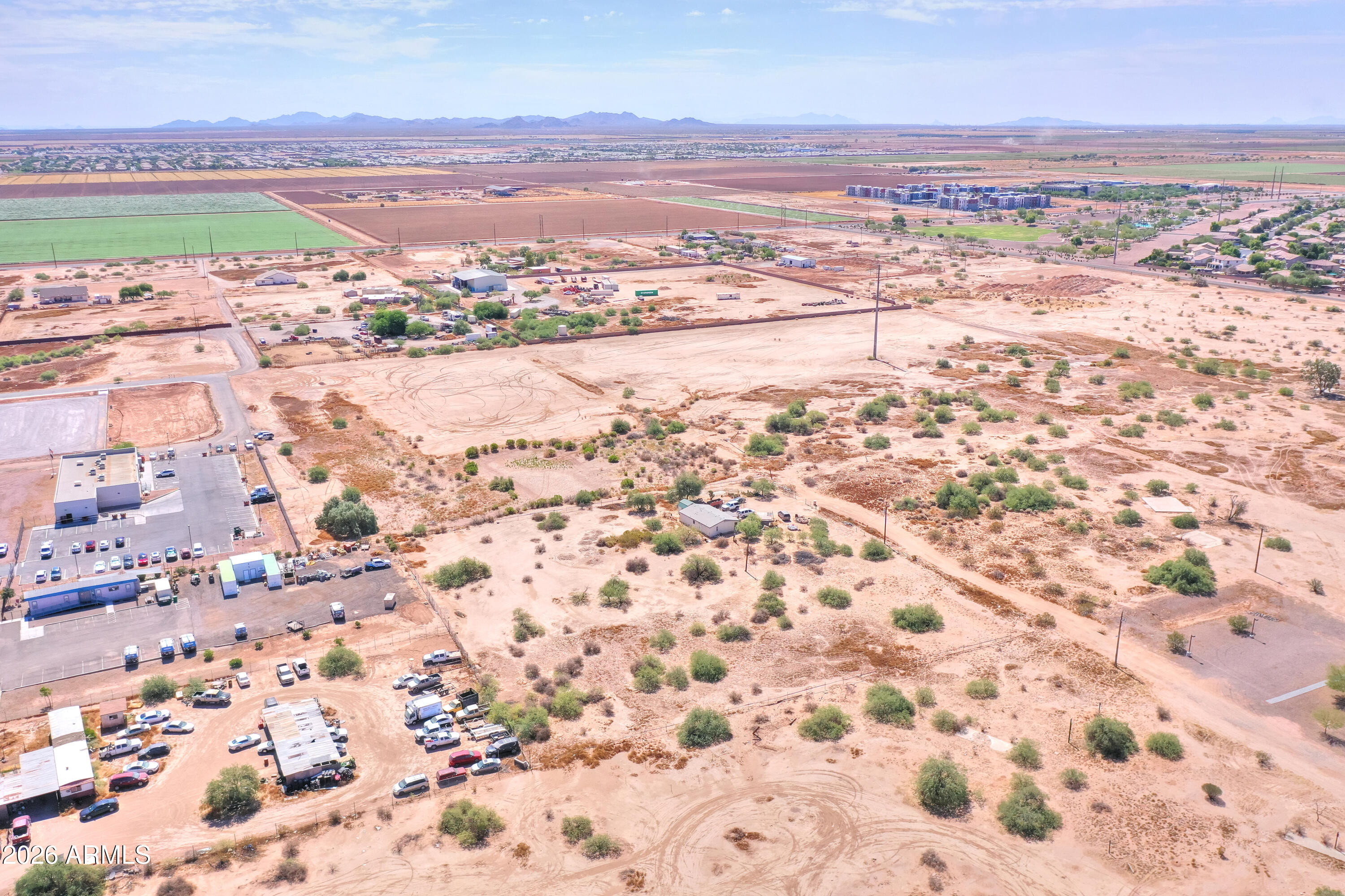 40526 West 7 Ranch Road Maricopa, AZ 85138 - Photo 11 of 14 an aerial view of residential houses with outdoor space