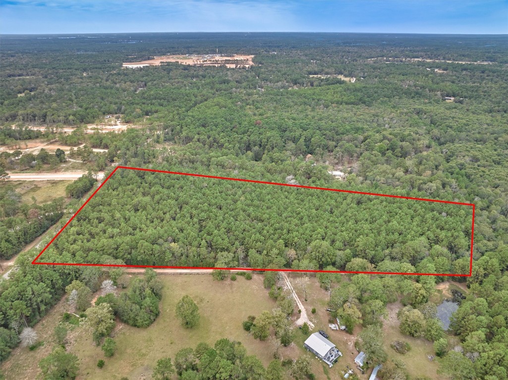 0 East Williams Road Conroe, TX 77303 - Photo 11 of 15 a view of a field with an ocean