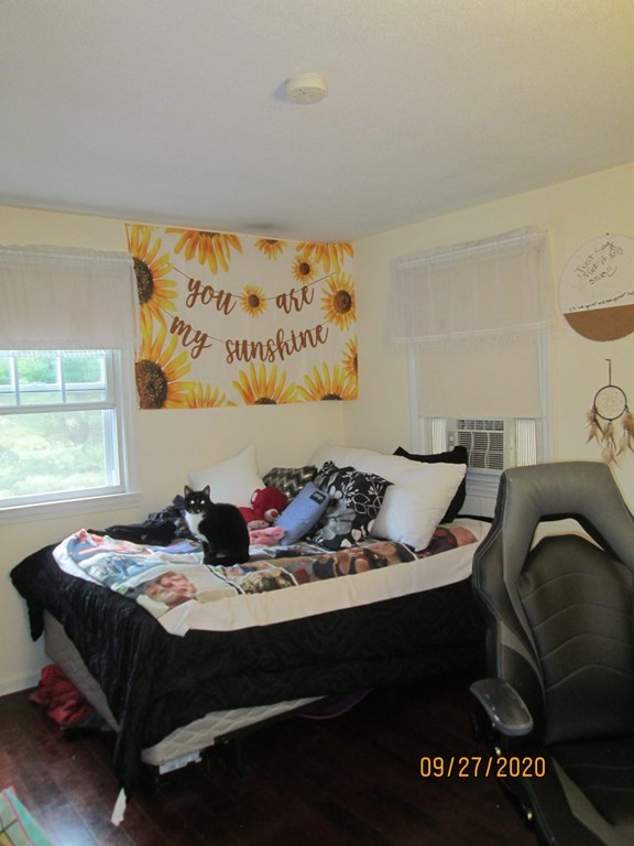 66 South Road Londonderry, NH 03053 - Photo 12 of 21 a bed room with furniture and a window
