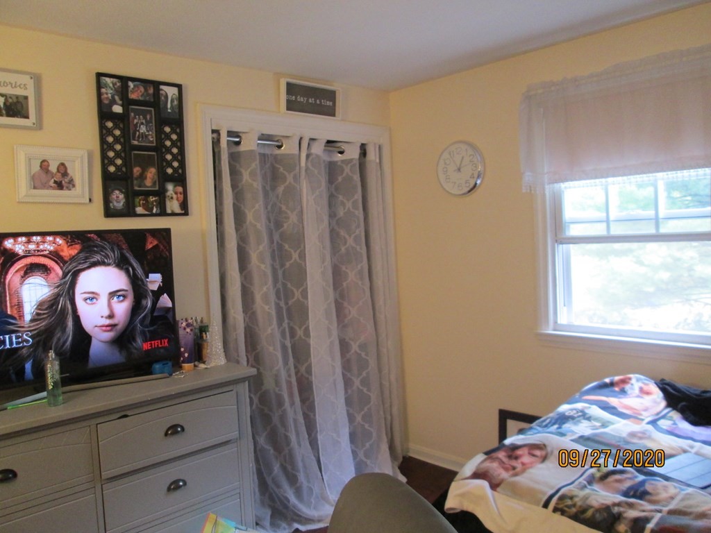 66 South Road Londonderry, NH 03053 - Photo 13 of 21 a bedroom with a bed and furniture